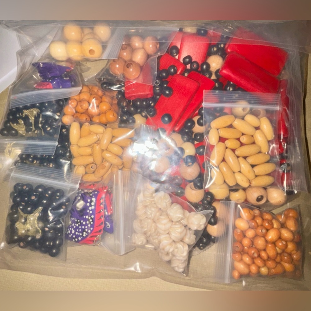 Assorted Wood Bead Collection in Red, Black, and Natural Tones